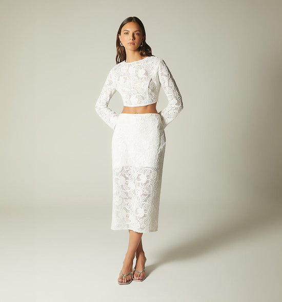 CONJUTNO DE BLUSA CROP MANGA LARGA CON F