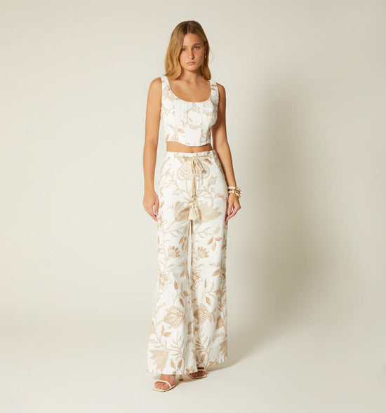 BLUSA STRAPLE EN JACQUARD CON CORDON