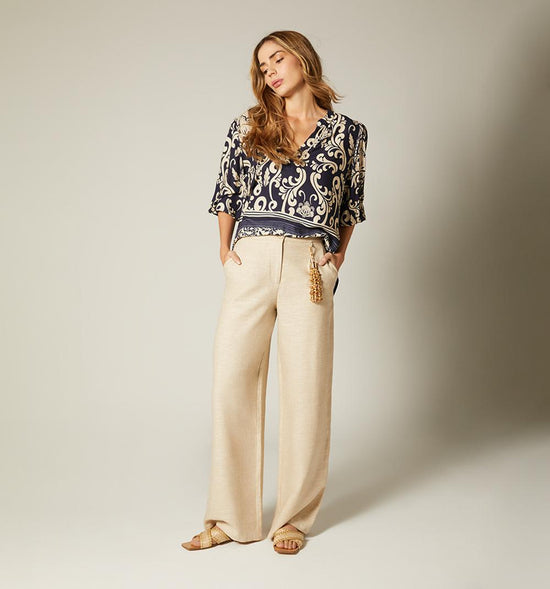 PANTALON PALAZZO CON DETALLE EN PRETINA